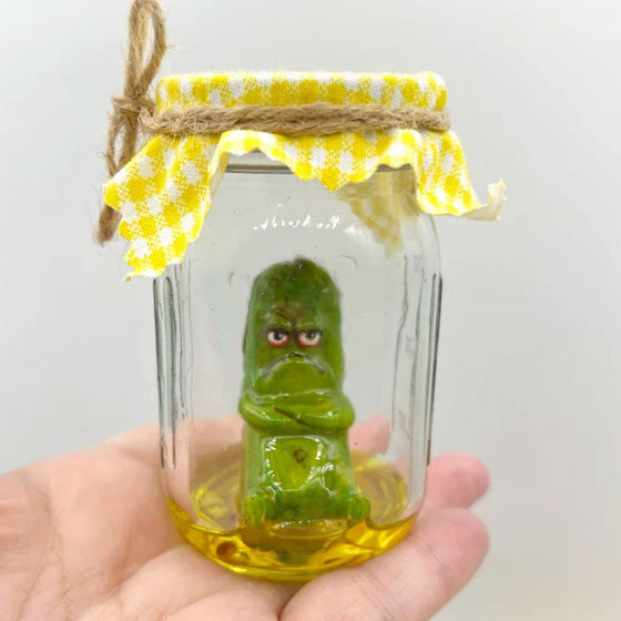 Grumpy Pickle in a Jar sculpture